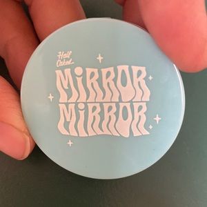 Brand new, half caked mirror mirror, in shade pinky promise